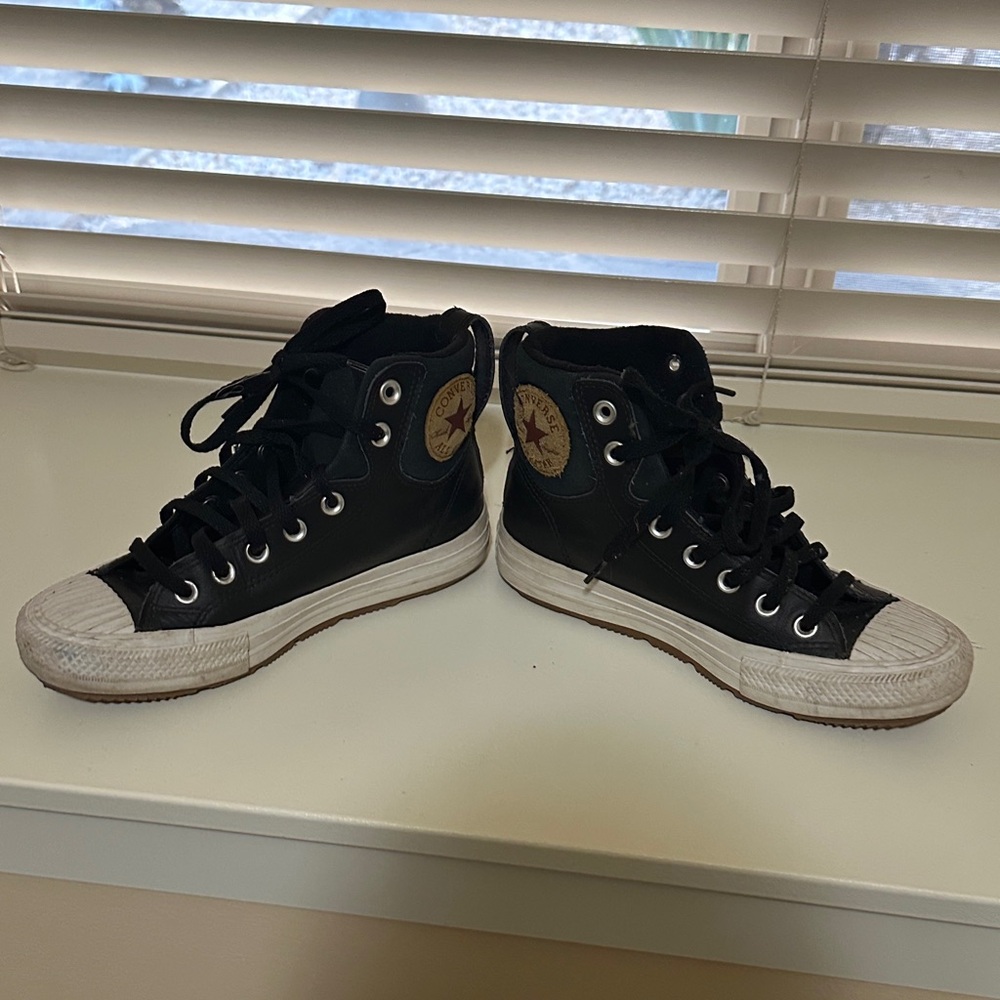 Converse black leather insulated high tops